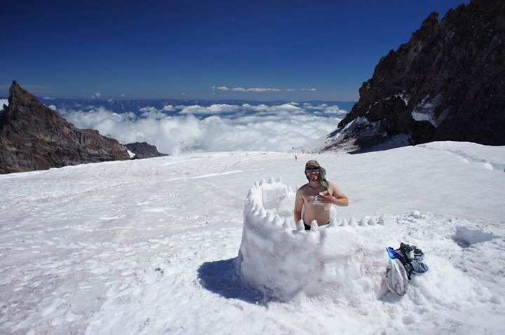 Levi, my partner, taking a baby wipe bath in our snow privy on Mt. Rainier (2014)